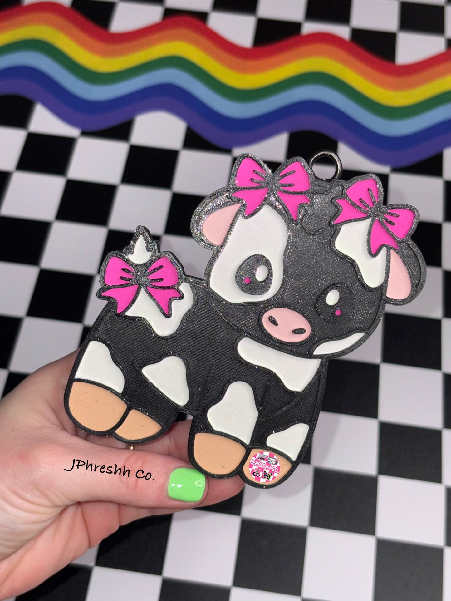 Cow w/ bows on head & tail